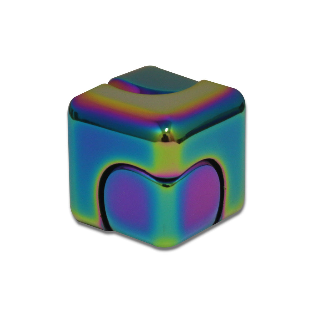 A shiny metallic GAP Gyro Cube Fidget with rounded edges and a rainbow iridescent finish features heart-shaped indents to enhance fine motor skills. Displayed on a white background.