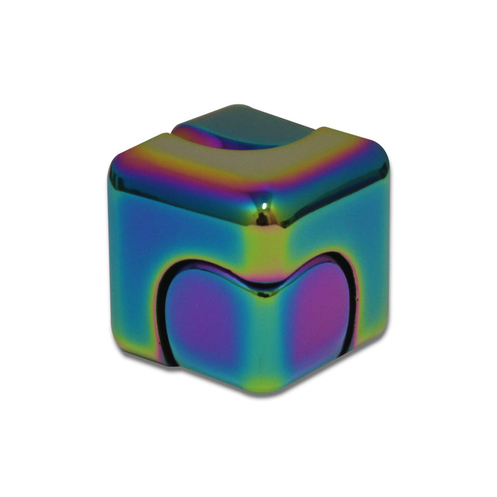 A shiny metallic GAP Gyro Cube Fidget with rounded edges and a rainbow iridescent finish features heart-shaped indents to enhance fine motor skills. Displayed on a white background.