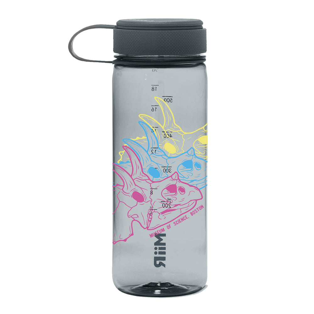 Introducing the Museum of Science Boston Ombre Cliff the Dino Water Bottle—a clear bottle featuring a black lid, a gray carrying loop, and vibrant dinosaur skull outlines. Volume markings in milliliters appear on the side, while “Museum of Science Boston” is printed near the bottom. Made from recycled materials, this water bottle makes an ideal souvenir for science lovers.