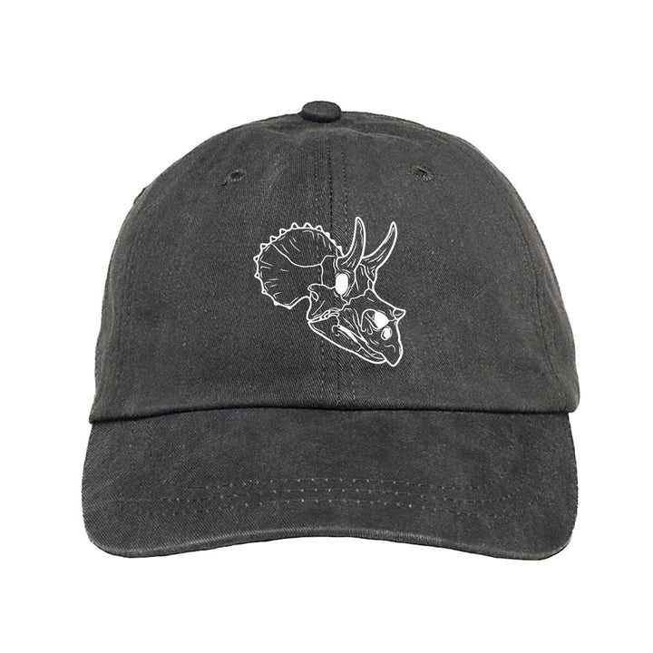 The Museum of Science Boston Cliff the Dino Skull Cap is a black cap featuring a white outline drawing of a triceratops dinosaur skull on the front—an ideal gift for paleontologists.