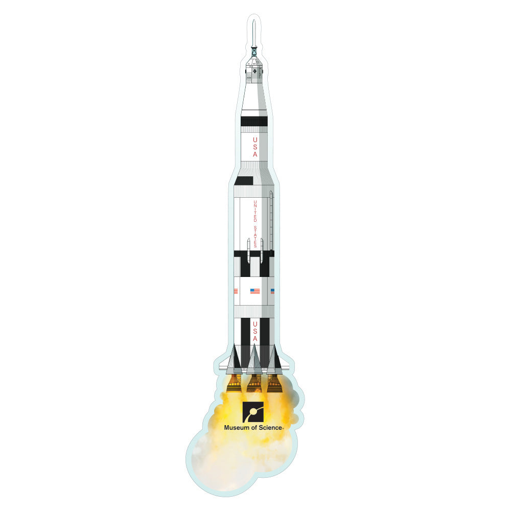 Featuring a vivid illustration of the Saturn V launching with bright flames and billowing smoke, the Museum of Science Boston Foil Rocket Magnet displays bold “USA” and “Museum of Science Boston” labels, making it a standout collectible for any space exploration fan.