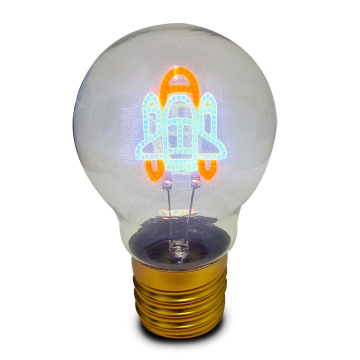 The Spaceship LED Lightbulb is a rocket-shaped light with blue and orange neon-style colors on a white background, ideal as a fun kids room lamp for young space exploration fans.
